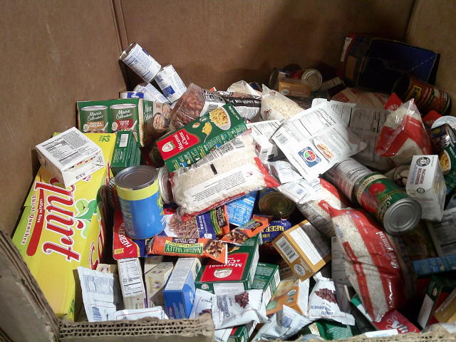Cardboard container full of food.